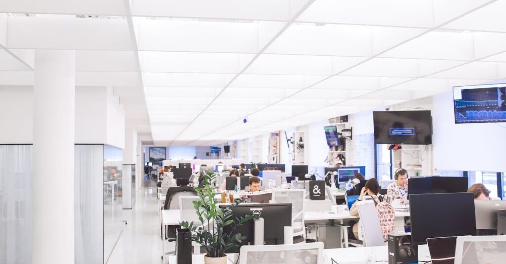 Spacious and well-lit office interior with modern furniture and workstations, ideal for a dynamic work environment.